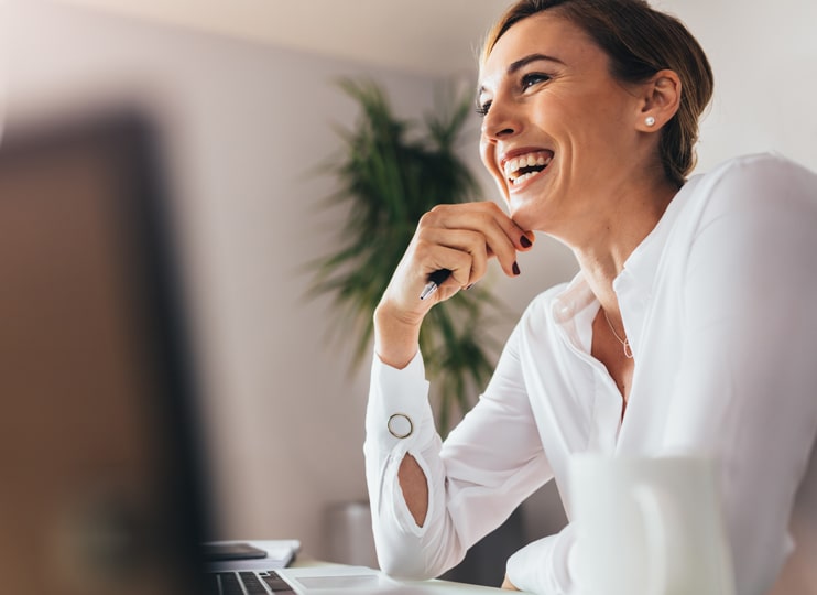 Woman with pen thinking about what VBR stands for