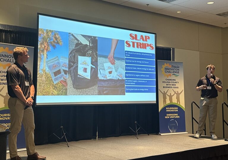 RK Supplements pitching their business on the stage